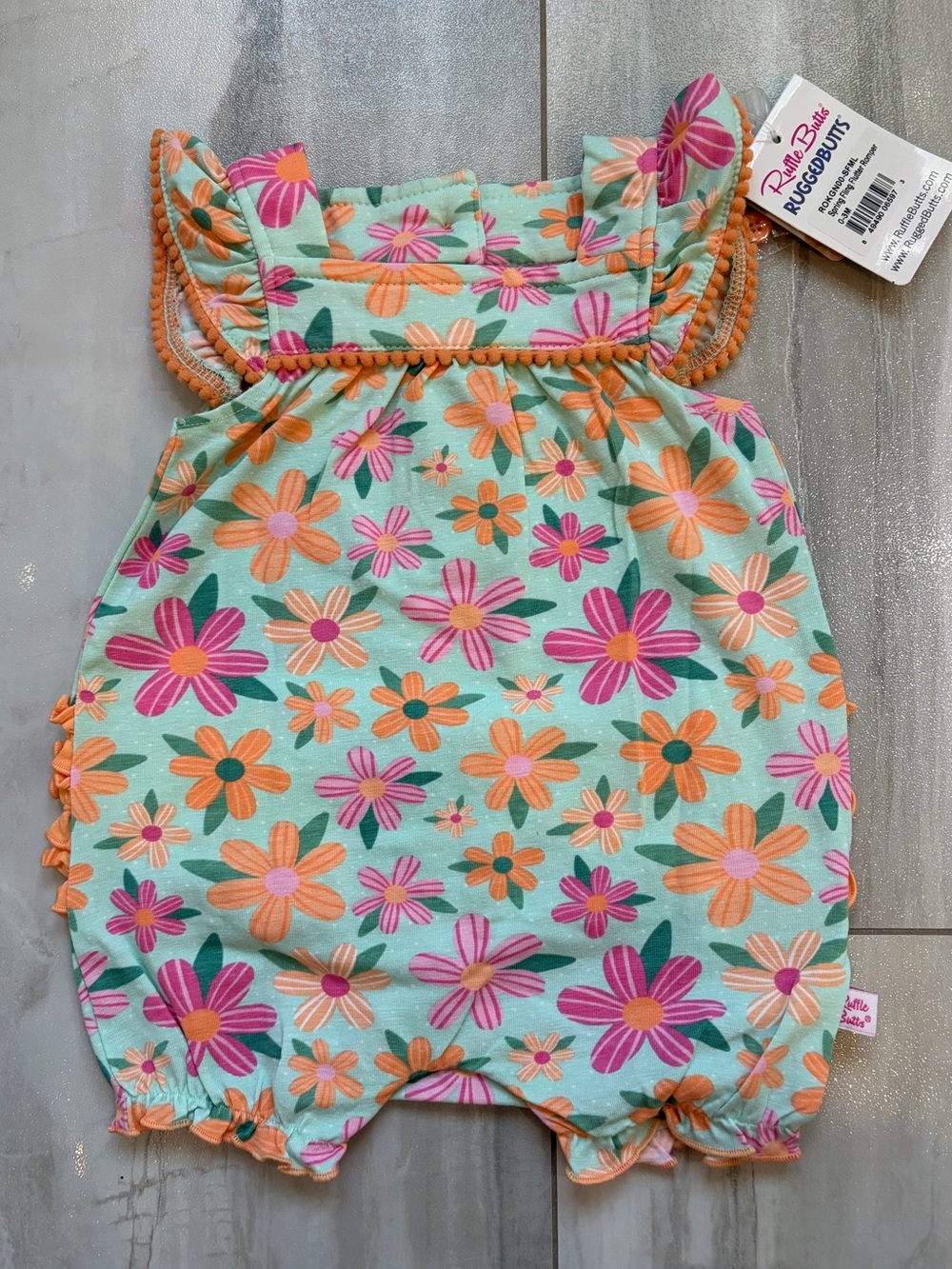 NWT RuffleButts Colorful Spring Fling Floral Ruffled Pom Pom Romper Girls 0-3M